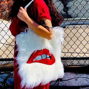 White faux fur tote bag with sequin lips!
